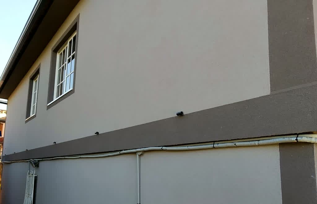 Fachada de una vivienda con aislamiento térmico exterior en Gondomar